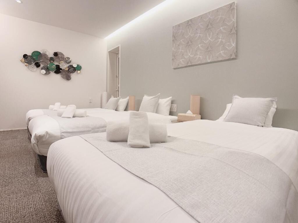 Deluxe Triple Room | Iron/ironing board, free WiFi, bed sheets