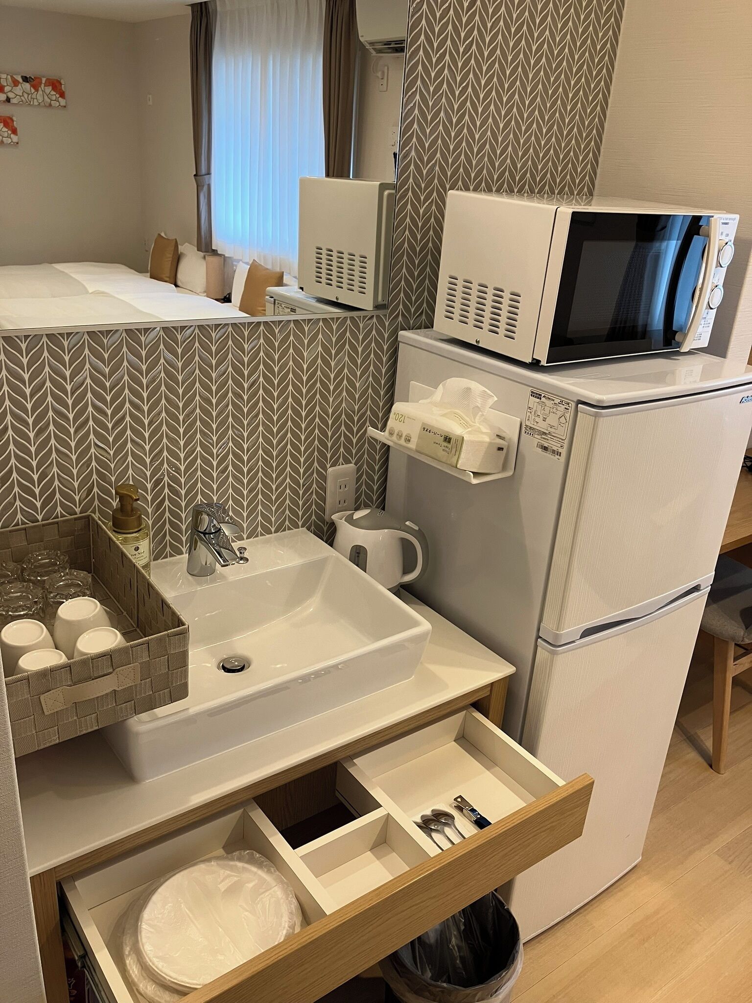 Full-size fridge, microwave, freezer, paper towels