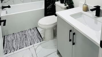 Hair dryer, towels, soap, shampoo