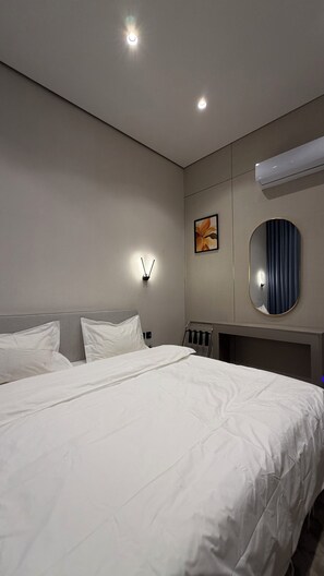 1 slaapkamer, een strijkplank/strijkijzer, internet, beddengoed