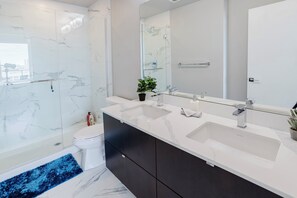 Shower, hair dryer, towels, soap - Epic River Valley View | 20th floor | Near Rogers (Edmonton)
