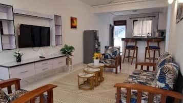 Deluxe Apartment, Balcony | Living area