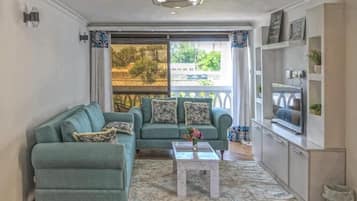 Standard Apartment, Balcony | Living area