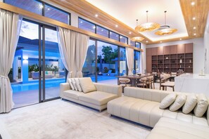 Premium Villa, 5 Bedrooms, Private Pool, Courtyard Area | Living room | 70-inch flat-screen TV with satellite channels, Netflix, Hulu - Ming Resort Phuket (Mai Khao)