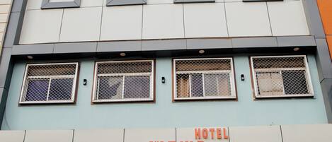 Deluxe Double Room, City View | Exterior detail