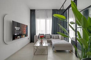 Lägenhet - utsikt mot staden | Vardagsrum