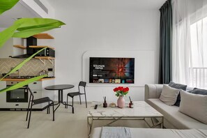 Lägenhet - utsikt mot staden | Vardagsrum