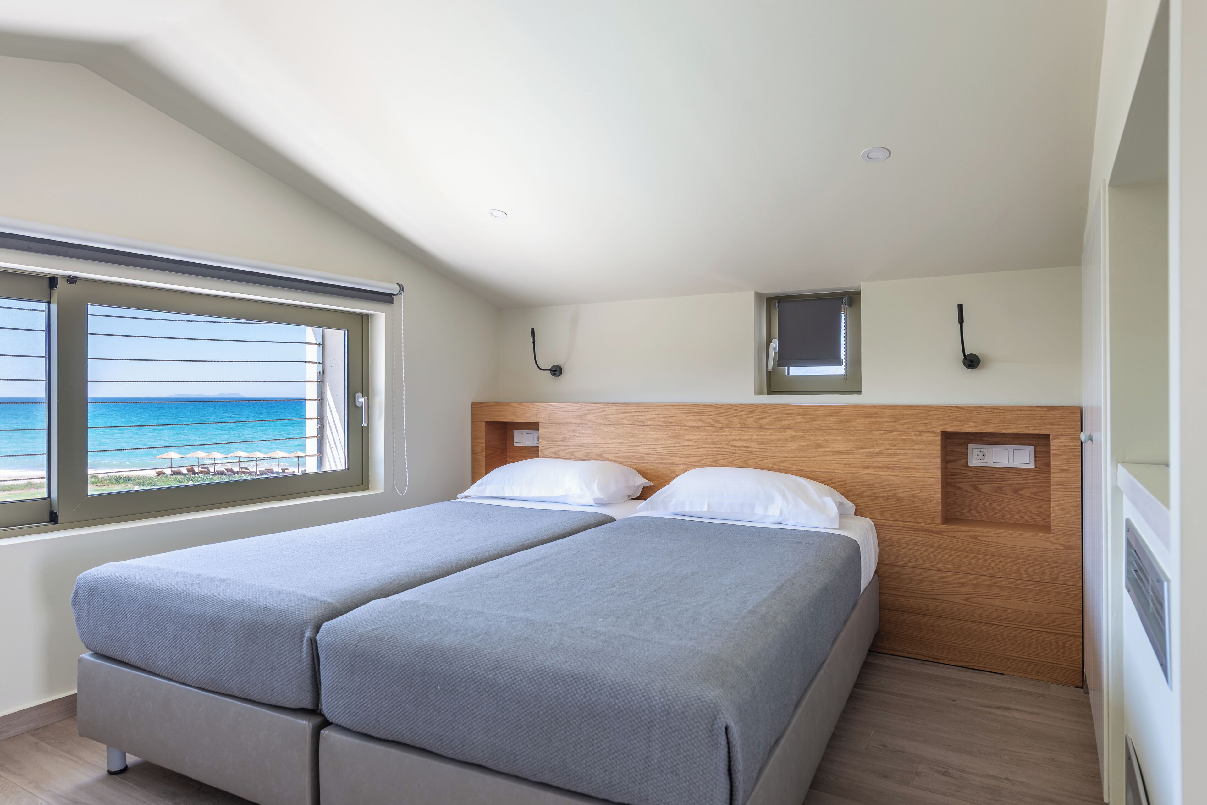 Premium Suite with direct sea view | In-room safe, blackout drapes, soundproofing, iron/ironing board