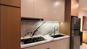 Familieleilighet, aircondition, byutsikt | Eget kjøkken