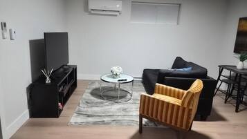 Appartement, 1 chambre | Salle de séjour | Téléviseur à écran plat