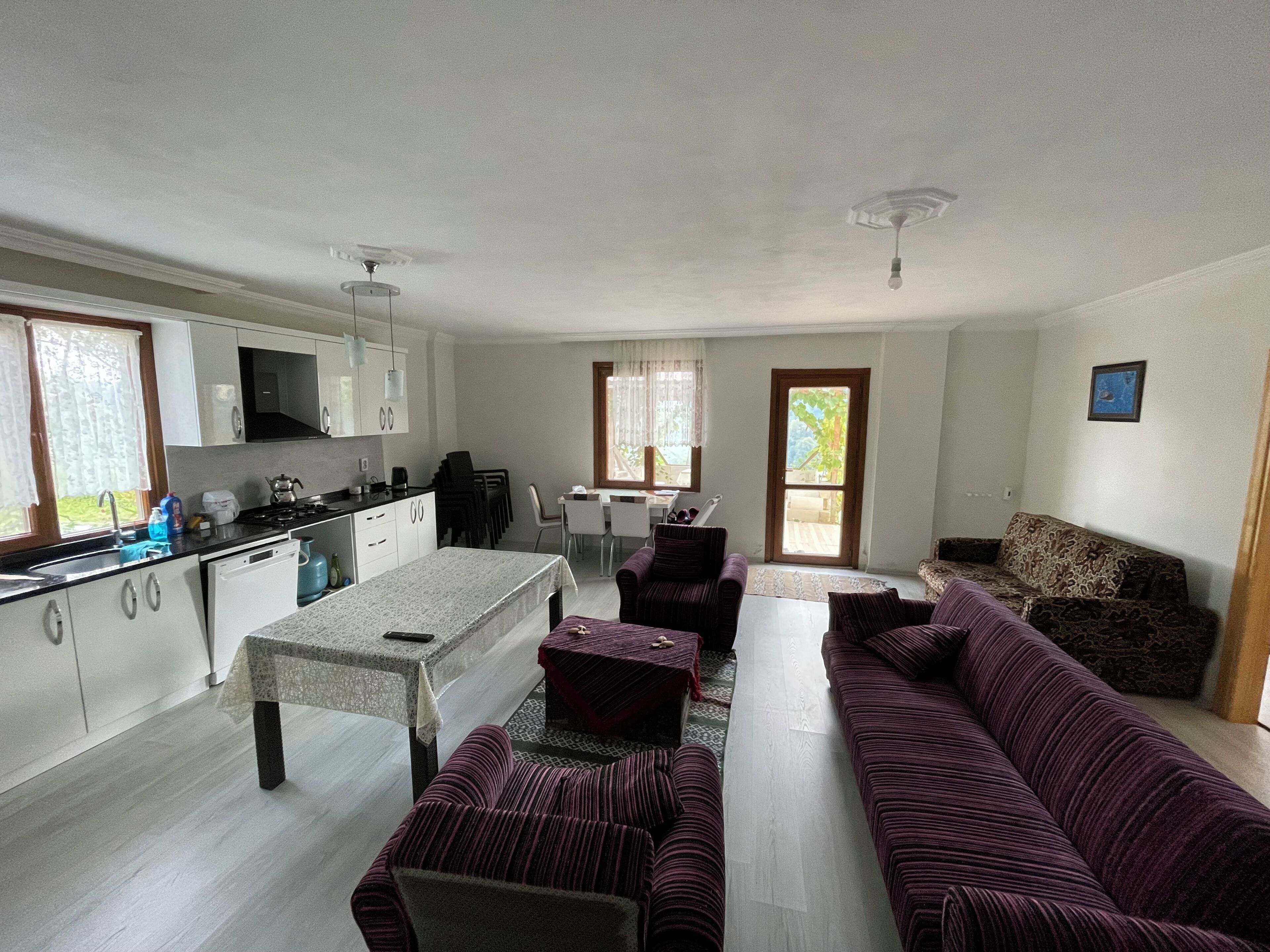 Family Apartment, Balcony, Garden View | Living area