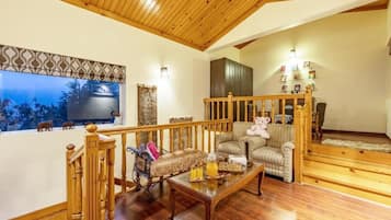 Standard Villa, Balcony, Garden View | Living area