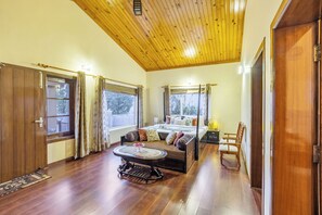 Villa estándar, balcón, vistas al jardín | Zona de estar