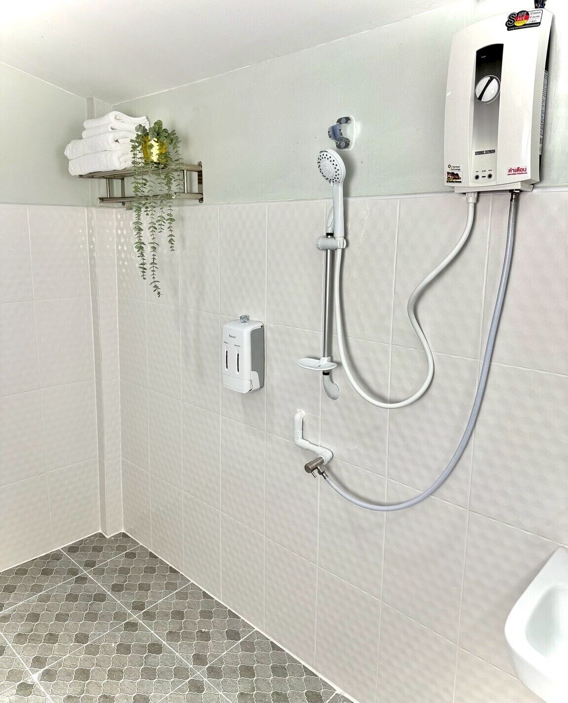 Habitación Deluxe doble | Baño | Jabón, champú y papel higiénico