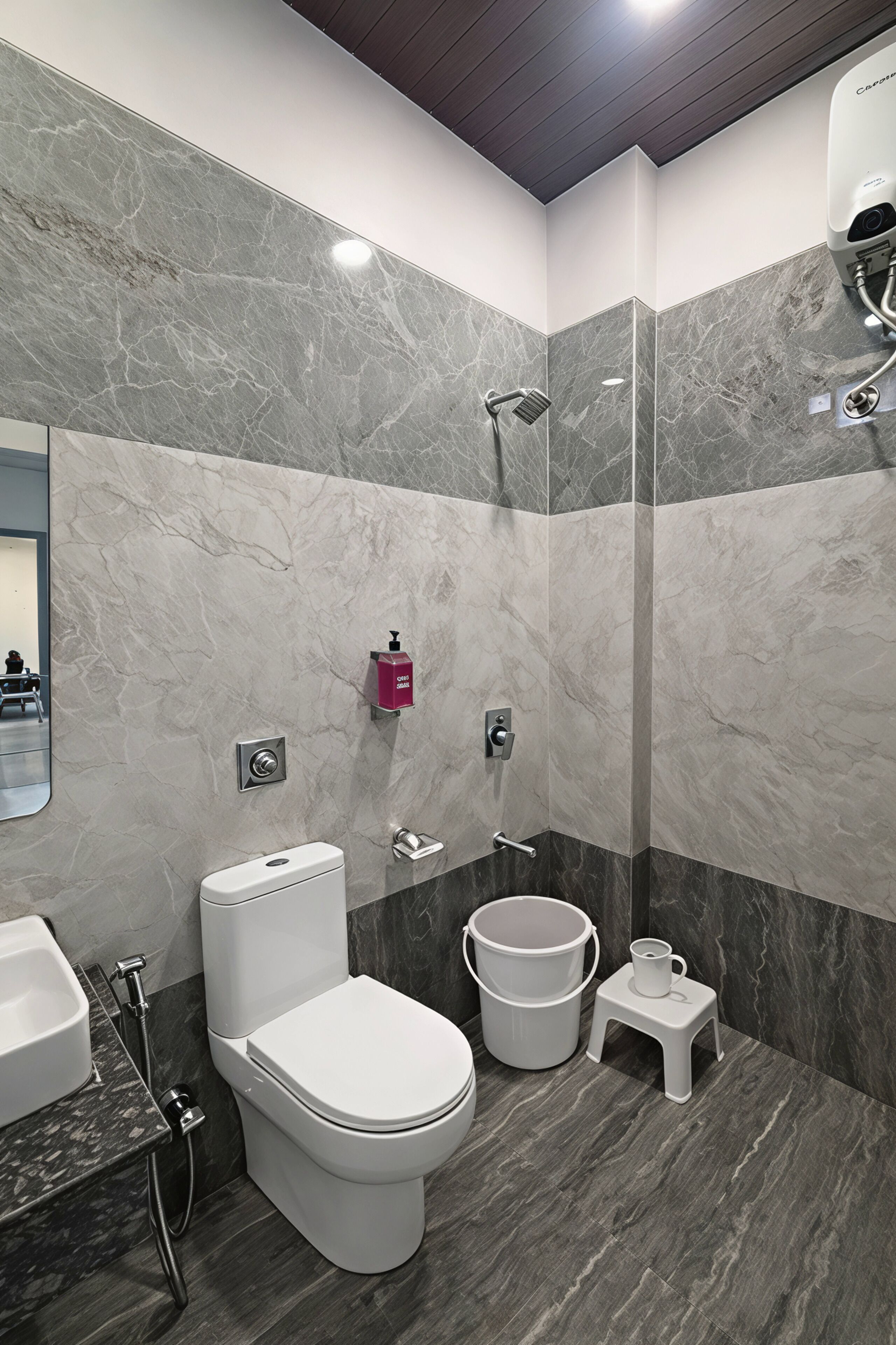 A modern bathroom with a toilet, bidet, and shower.