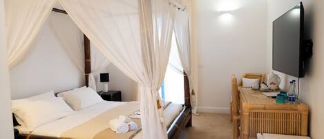 Chambre Deluxe | Coffre-fort, accĂšs au Wi-Fi (inclus), literie fournie