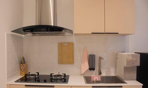 Fridge, stovetop, dishwasher, cookware/dishes/utensils