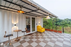 Outdoor dining - ADV 412 by Soumil's Stays (Varsoli)