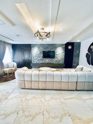 Apartamento superior | Área de estar