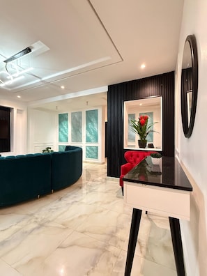 Apartamento superior | Saguão