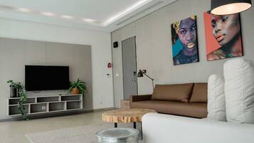 Suite Premium, non-fumeurs, vue jardin | Coin séjour