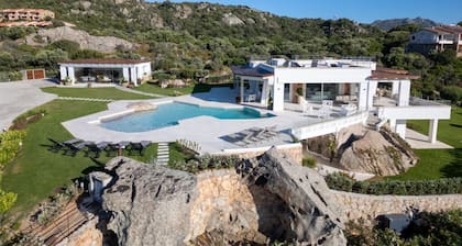 Situated in one of Porto Rotondo's most exclusive locations, this extraordinary villa is one of the most refined private residences on the prestigious Costa Smeralda. A place where contemporary architecture, Mediterranean elegance, and absolute privacy b
