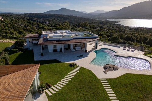 Situated in one of Porto Rotondo's most exclusive locations, this extraordinary villa is one of the most refined private residences on the prestigious Costa Smeralda. A place where contemporary architecture, Mediterranean elegance, and absolute privacy b