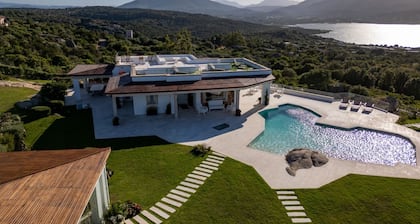 Situated in one of Porto Rotondo's most exclusive locations, this extraordinary villa is one of the most refined private residences on the prestigious Costa Smeralda. A place where contemporary architecture, Mediterranean elegance, and absolute privacy b