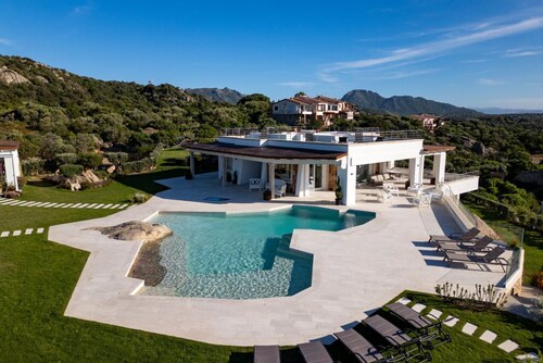 Situated in one of Porto Rotondo's most exclusive locations, this extraordinary villa is one of the most refined private residences on the prestigious Costa Smeralda. A place where contemporary architecture, Mediterranean elegance, and absolute privacy b