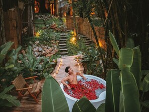 Deluxe villa, uitzicht op tuin | Woonruimte