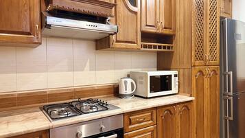 Family Suite, Balcony, Courtyard View | Private kitchen