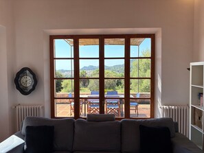 TV, fireplace - Country House 'Fetget' with Mountain View, Private Pool and Wi-Fi (Illes Balears)