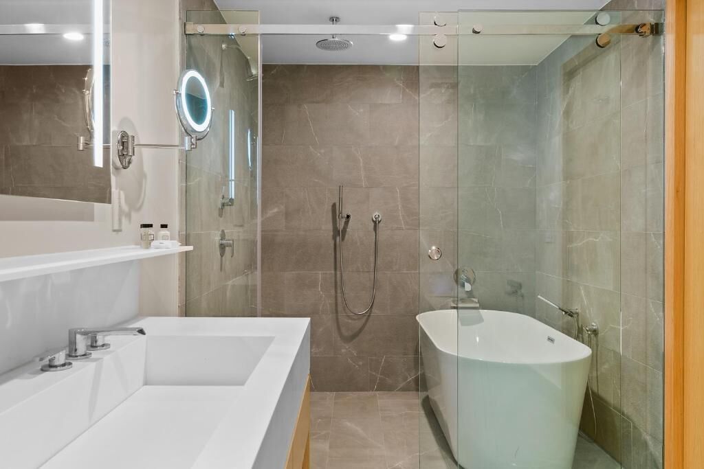 Designer toiletries, hair dryer, bathrobes, towels
