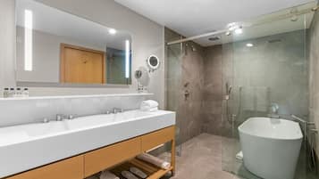 Designer toiletries, hair dryer, bathrobes, towels