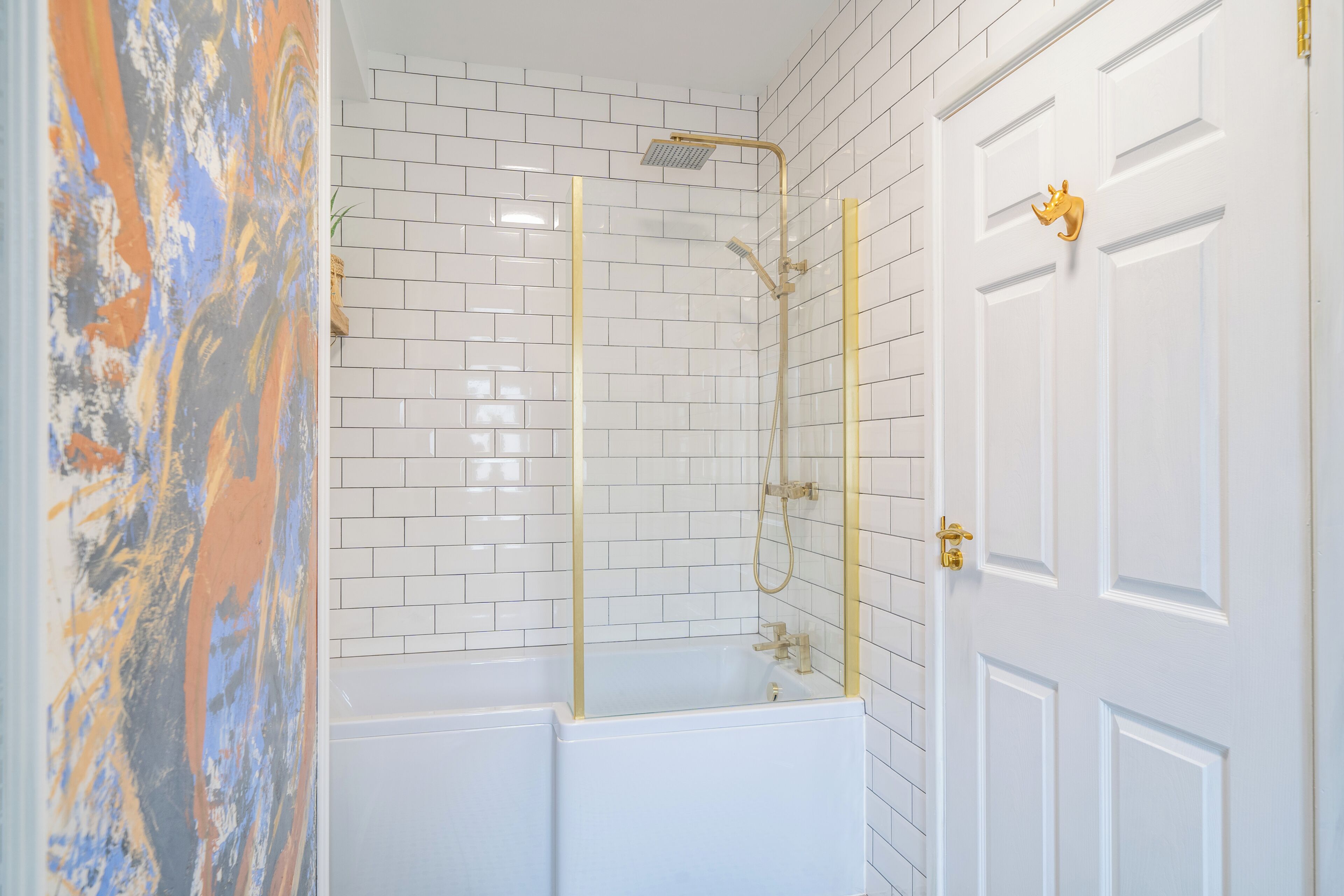 Shower, hair dryer, towels, toilet paper