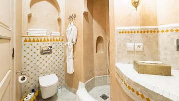 Shower, hair dryer, bathrobes, towels