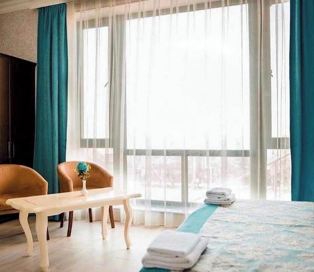 Deluxe kamer, 1 twee- of 2 eenpersoonsbedden, uitzicht op zee | Interieur