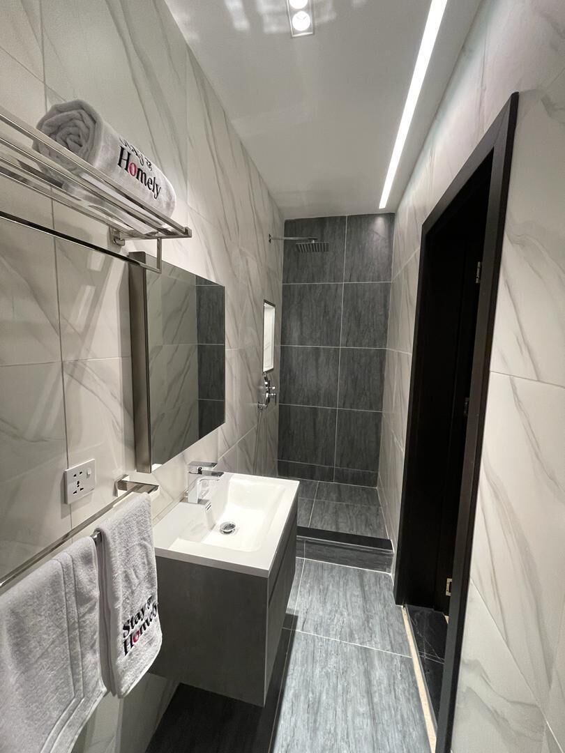 Shower, slippers, bidet, towels