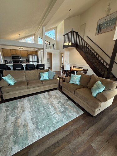 Margarita Manor on Staniel Cay is a spacious 4 bed, 4.5 bath home in Margaritaville Resort, Osage Beach. Sleeps 14 with resort amenities including pools, dining, golf, and nearby boat rentals. Perfect for family getaways near the lake.