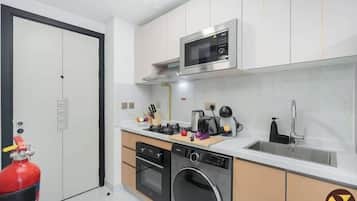 Luksusstudio, balkong, byutsikt | Eget kjøkken