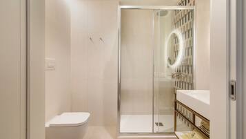 Hair dryer, bidet, towels, soap