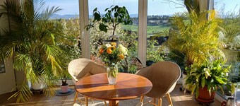 Apartment for 2 persons in a detached house with garden facing south.