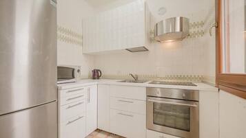 Departamento superior, balcón, vista al patio | Cocina privada