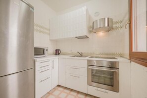 Departamento superior, balcón, vista al patio | Cocina privada