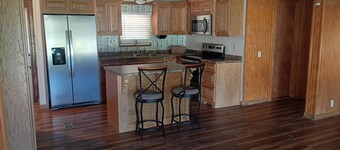 3-Bedroom 2-bath Home – Covered Porch & Deck, Fenced front Yard, Carport, AC!”