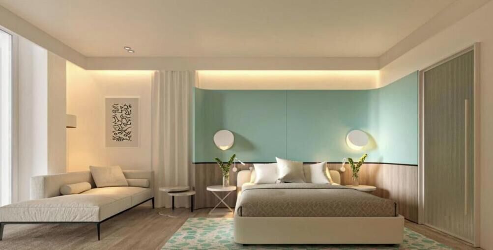 Deluxe Triple Room, Sea View | Minibar, in-room safe, desk, laptop workspace