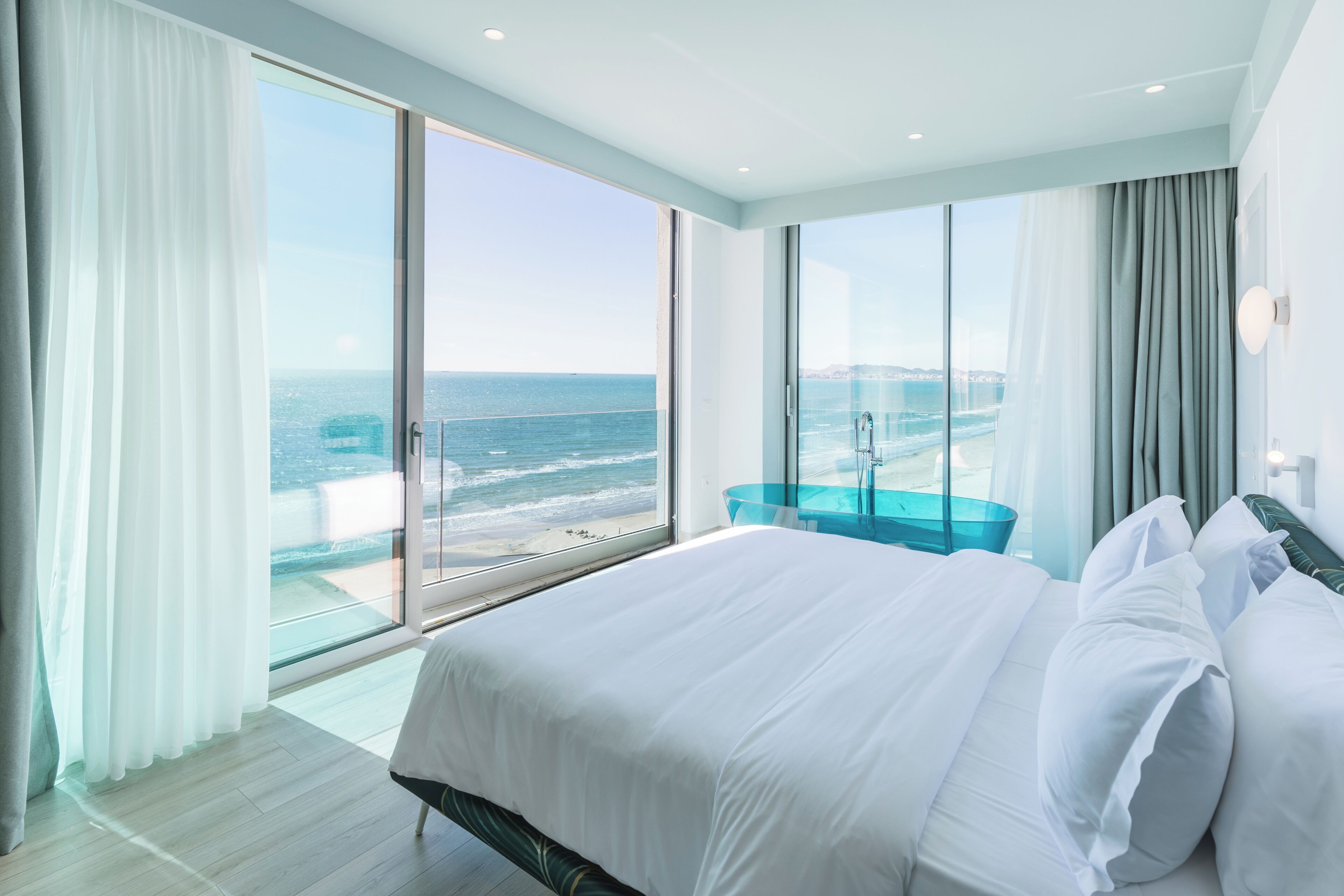 Junior Double Room, Sea View | Minibar, in-room safe, desk, laptop workspace