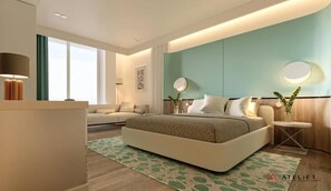 Habitación triple Deluxe, vista al mar | Minibar, caja de seguridad en la habitación y escritorio 