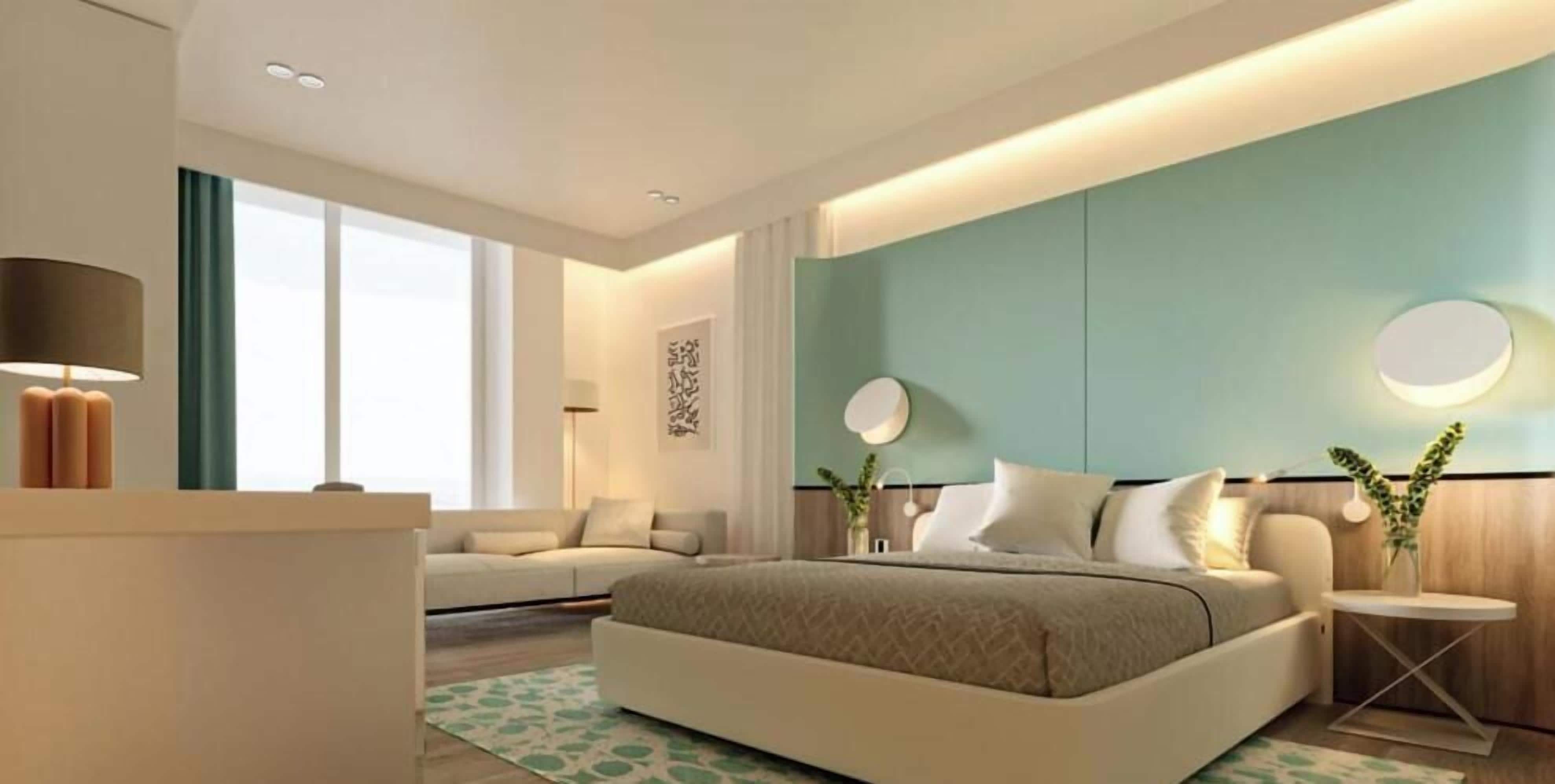 Phòng 3 Deluxe, quang cảnh biển | Minibar, két bảo mật tại phòng, bàn 