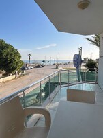 Family Apartment, Balcony, Sea View | Outdoor dining